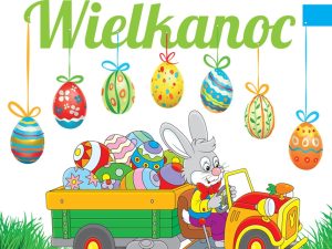 Napis Wielkanoc. Królik wiozący na pace samochodu pisanki